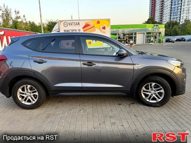 Серый Хендай Туксон, объемом двигателя 2 л и пробегом 92 тыс. км за 17800 $, фото 2 на Automoto.ua