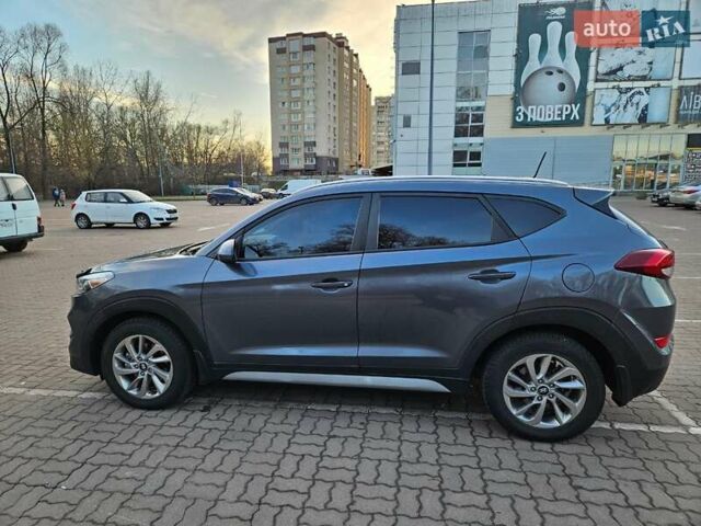 Серый Хендай Туксон, объемом двигателя 2 л и пробегом 134 тыс. км за 14600 $, фото 6 на Automoto.ua