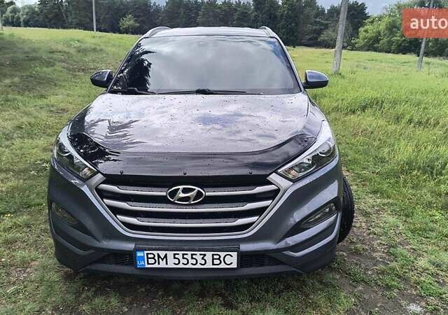 Серый Хендай Туксон, объемом двигателя 2 л и пробегом 133 тыс. км за 15300 $, фото 1 на Automoto.ua