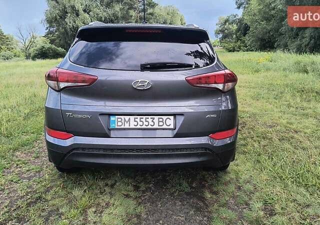 Серый Хендай Туксон, объемом двигателя 2 л и пробегом 133 тыс. км за 15300 $, фото 4 на Automoto.ua