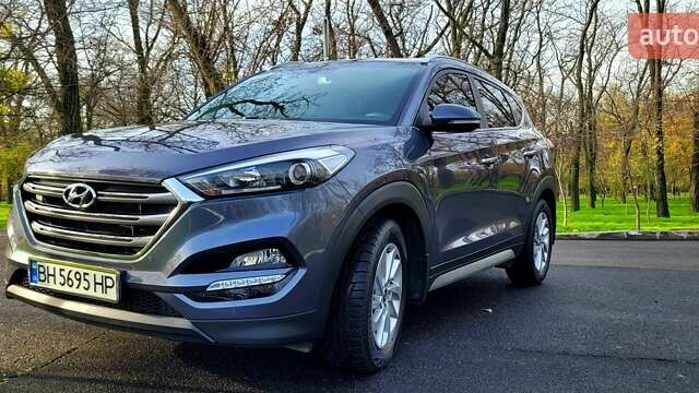 Серый Хендай Туксон, объемом двигателя 2 л и пробегом 19 тыс. км за 25000 $, фото 6 на Automoto.ua