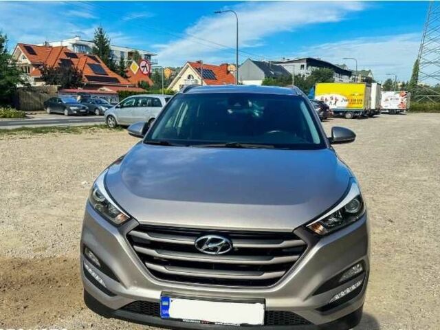 Серый Хендай Туксон, объемом двигателя 2.4 л и пробегом 94 тыс. км за 10700 $, фото 9 на Automoto.ua