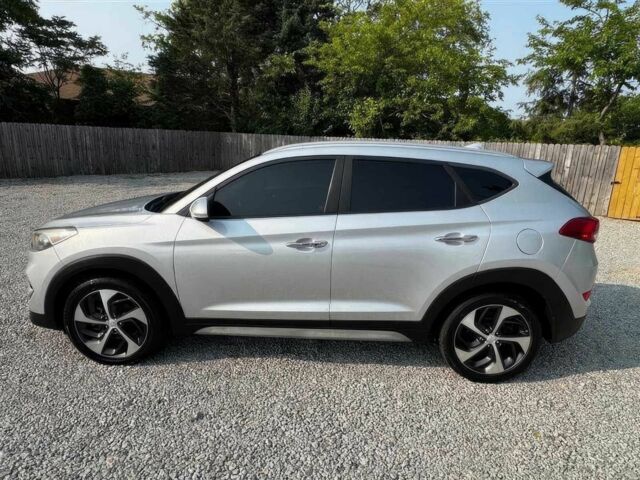 Сірий Хендай Туксон, об'ємом двигуна 1.6 л та пробігом 56 тис. км за 6800 $, фото 4 на Automoto.ua