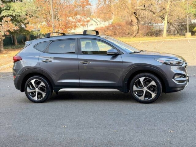 Сірий Хендай Туксон, об'ємом двигуна 1.6 л та пробігом 60 тис. км за 8000 $, фото 6 на Automoto.ua