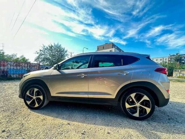 Серый Хендай Туксон, объемом двигателя 2.4 л и пробегом 94 тыс. км за 10700 $, фото 4 на Automoto.ua