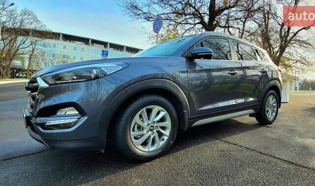 Серый Хендай Туксон, объемом двигателя 2 л и пробегом 19 тыс. км за 25000 $, фото 13 на Automoto.ua
