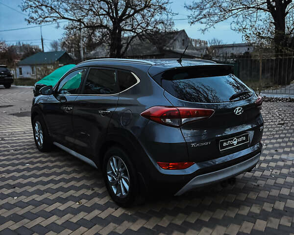 Сірий Хендай Туксон, об'ємом двигуна 1.6 л та пробігом 133 тис. км за 19000 $, фото 4 на Automoto.ua