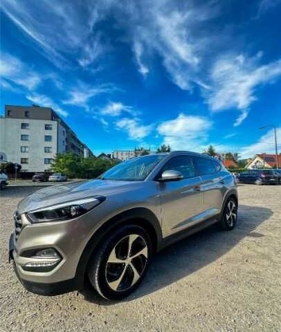 Серый Хендай Туксон, объемом двигателя 2.4 л и пробегом 94 тыс. км за 10700 $, фото 2 на Automoto.ua