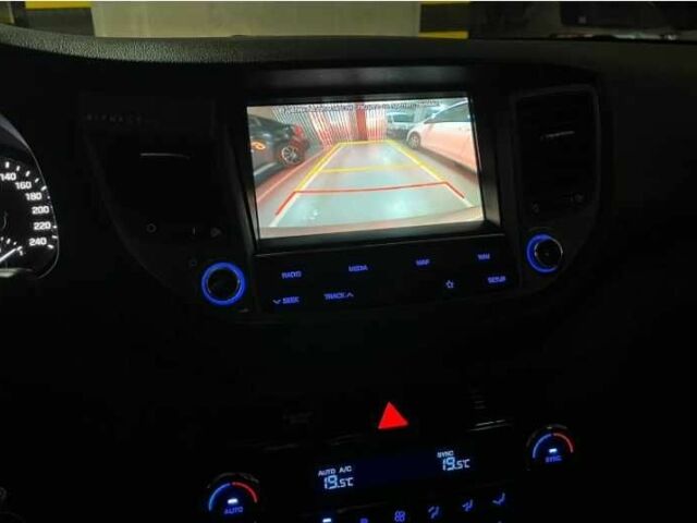 Серый Хендай Туксон, объемом двигателя 2.4 л и пробегом 94 тыс. км за 10700 $, фото 20 на Automoto.ua