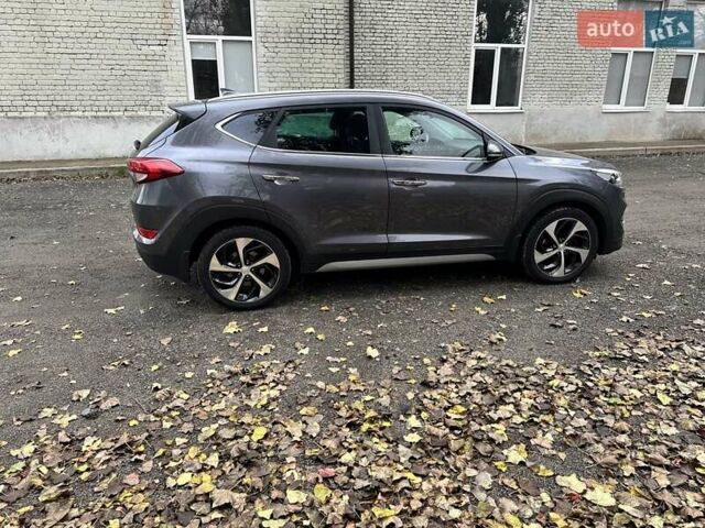Серый Хендай Туксон, объемом двигателя 2 л и пробегом 140 тыс. км за 18200 $, фото 5 на Automoto.ua
