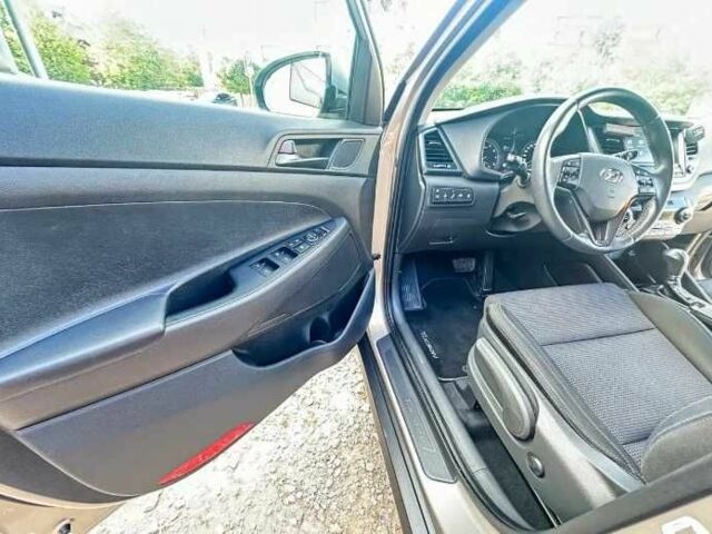 Серый Хендай Туксон, объемом двигателя 2.4 л и пробегом 94 тыс. км за 10700 $, фото 16 на Automoto.ua