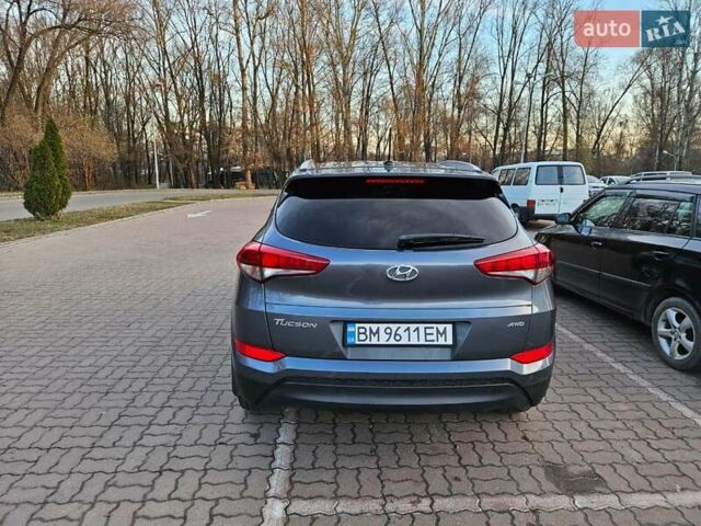 Серый Хендай Туксон, объемом двигателя 2 л и пробегом 134 тыс. км за 14600 $, фото 5 на Automoto.ua