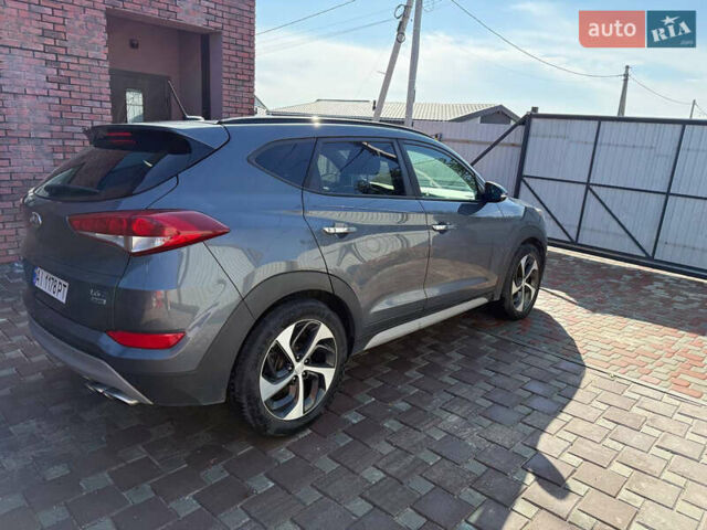 Сірий Хендай Туксон, об'ємом двигуна 1.59 л та пробігом 125 тис. км за 17000 $, фото 5 на Automoto.ua