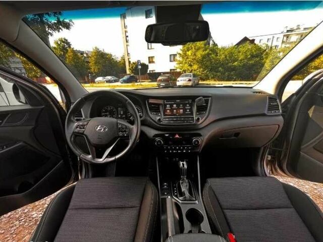 Серый Хендай Туксон, объемом двигателя 2.4 л и пробегом 94 тыс. км за 10700 $, фото 12 на Automoto.ua