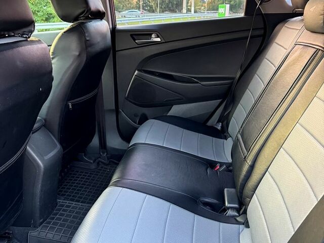 Серый Хендай Туксон, объемом двигателя 2 л и пробегом 92 тыс. км за 17800 $, фото 12 на Automoto.ua