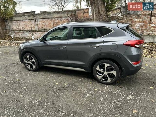 Серый Хендай Туксон, объемом двигателя 2 л и пробегом 140 тыс. км за 18200 $, фото 2 на Automoto.ua