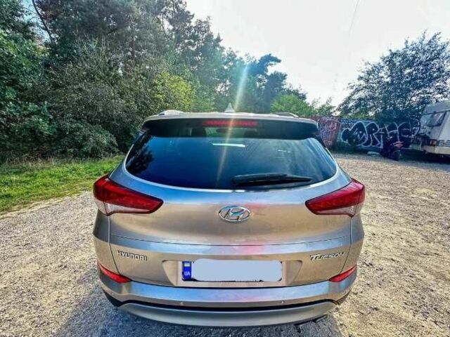 Серый Хендай Туксон, объемом двигателя 2.4 л и пробегом 94 тыс. км за 10700 $, фото 6 на Automoto.ua