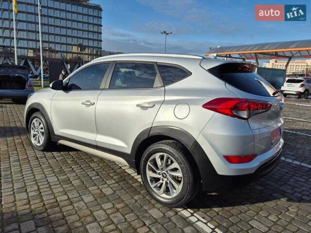 Серый Хендай Туксон, объемом двигателя 2 л и пробегом 121 тыс. км за 15300 $, фото 6 на Automoto.ua