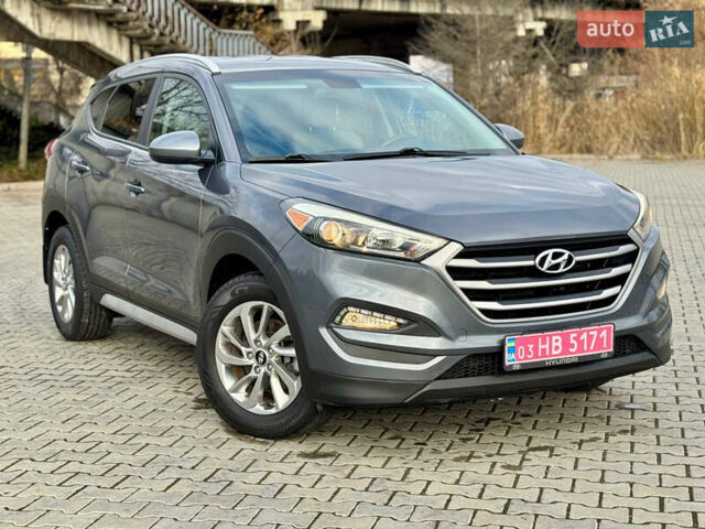 Сірий Хендай Туксон, об'ємом двигуна 2 л та пробігом 184 тис. км за 13950 $, фото 59 на Automoto.ua