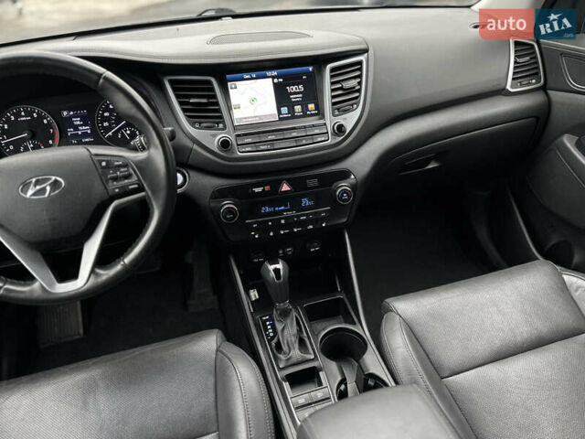 Серый Хендай Туксон, объемом двигателя 1.6 л и пробегом 92 тыс. км за 17900 $, фото 43 на Automoto.ua