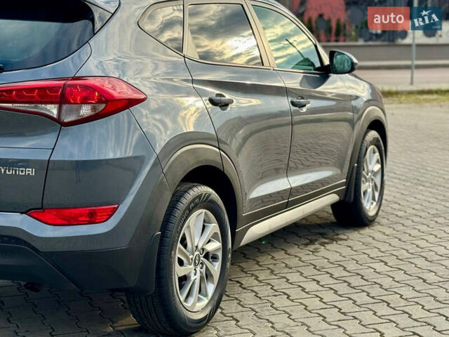 Сірий Хендай Туксон, об'ємом двигуна 2 л та пробігом 184 тис. км за 13950 $, фото 29 на Automoto.ua