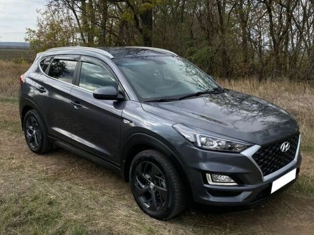 Серый Хендай Туксон, объемом двигателя 2 л и пробегом 99 тыс. км за 9600 $, фото 2 на Automoto.ua