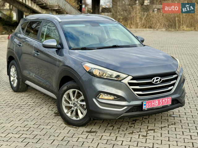 Серый Хендай Туксон, объемом двигателя 2 л и пробегом 183 тыс. км за 13750 $, фото 17 на Automoto.ua