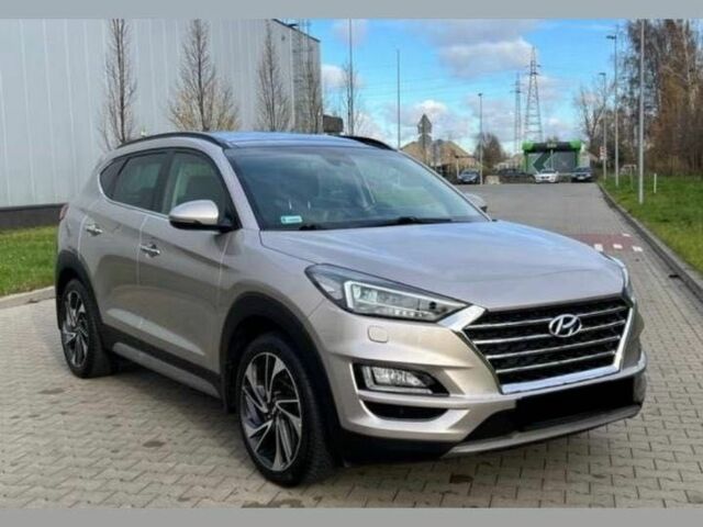 Серый Хендай Туксон, объемом двигателя 1.6 л и пробегом 93 тыс. км за 9000 $, фото 5 на Automoto.ua