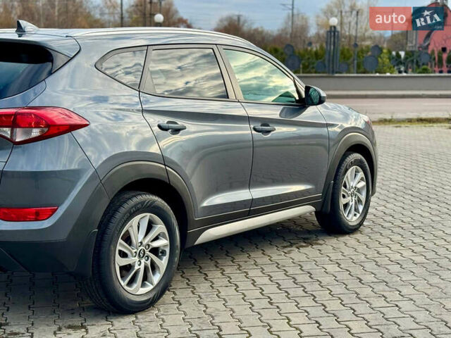 Сірий Хендай Туксон, об'ємом двигуна 2 л та пробігом 184 тис. км за 13950 $, фото 37 на Automoto.ua
