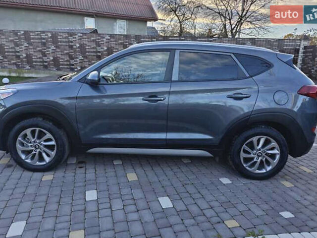 Серый Хендай Туксон, объемом двигателя 2 л и пробегом 68 тыс. км за 15500 $, фото 11 на Automoto.ua