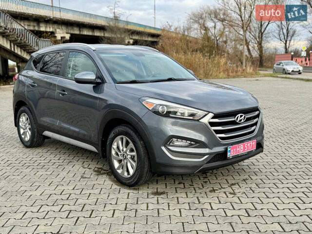 Сірий Хендай Туксон, об'ємом двигуна 2 л та пробігом 184 тис. км за 13950 $, фото 4 на Automoto.ua