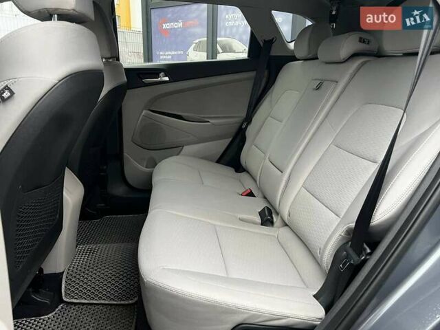 Серый Хендай Туксон, объемом двигателя 1.98 л и пробегом 139 тыс. км за 19500 $, фото 14 на Automoto.ua