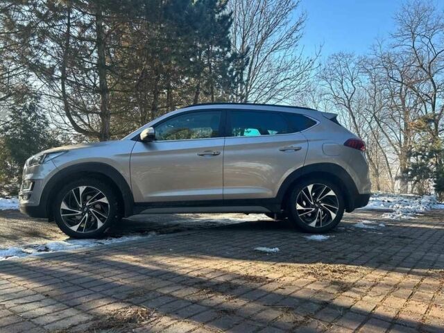 Серый Хендай Туксон, объемом двигателя 2 л и пробегом 96 тыс. км за 10000 $, фото 4 на Automoto.ua