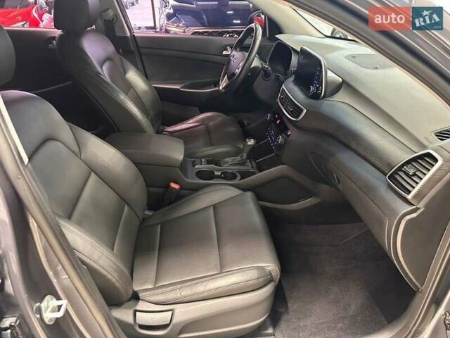 Серый Хендай Туксон, объемом двигателя 2 л и пробегом 69 тыс. км за 20900 $, фото 17 на Automoto.ua