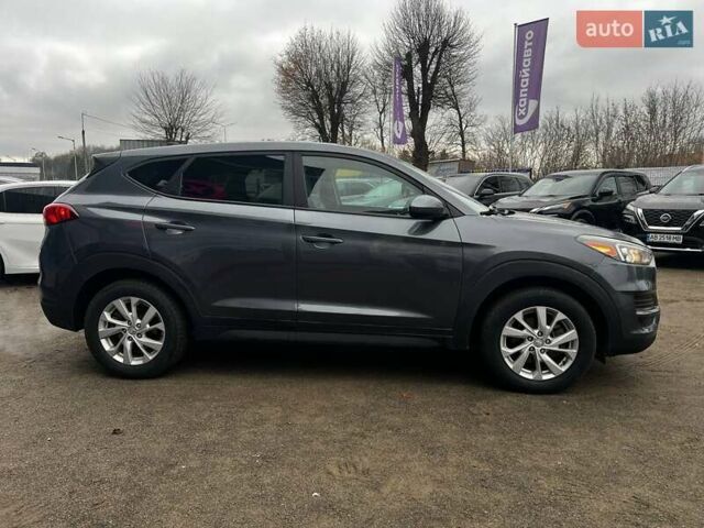 Серый Хендай Туксон, объемом двигателя 1.98 л и пробегом 139 тыс. км за 19500 $, фото 3 на Automoto.ua