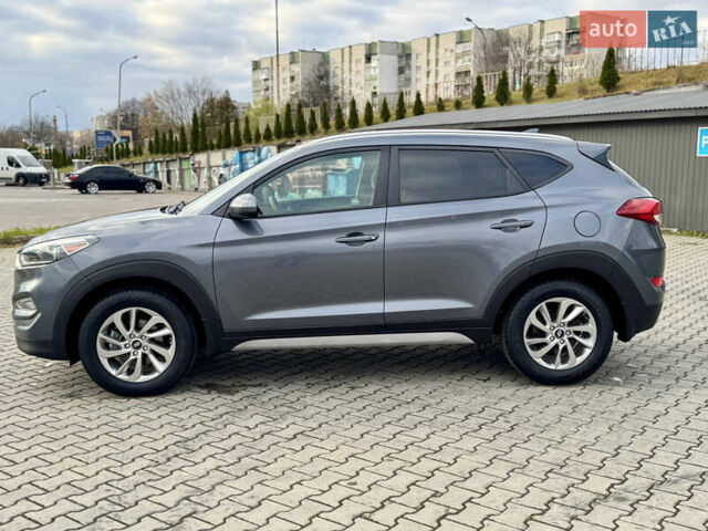 Серый Хендай Туксон, объемом двигателя 2 л и пробегом 183 тыс. км за 13750 $, фото 65 на Automoto.ua