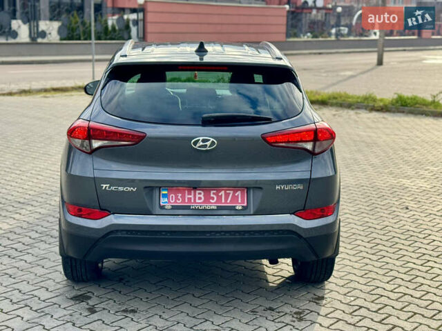 Серый Хендай Туксон, объемом двигателя 2 л и пробегом 183 тыс. км за 13750 $, фото 6 на Automoto.ua