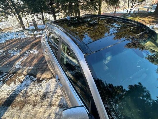 Серый Хендай Туксон, объемом двигателя 2 л и пробегом 96 тыс. км за 10000 $, фото 5 на Automoto.ua