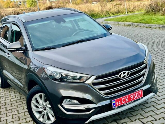 Серый Хендай Туксон, объемом двигателя 2 л и пробегом 115 тыс. км за 13950 $, фото 4 на Automoto.ua
