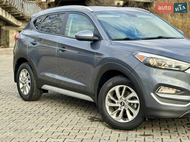 Серый Хендай Туксон, объемом двигателя 2 л и пробегом 183 тыс. км за 13750 $, фото 19 на Automoto.ua