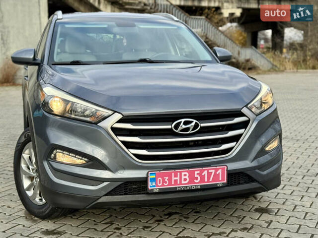 Серый Хендай Туксон, объемом двигателя 2 л и пробегом 183 тыс. км за 13750 $, фото 1 на Automoto.ua