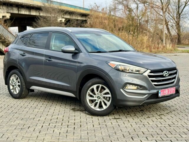 Серый Хендай Туксон, объемом двигателя 2 л и пробегом 115 тыс. км за 13950 $, фото 1 на Automoto.ua