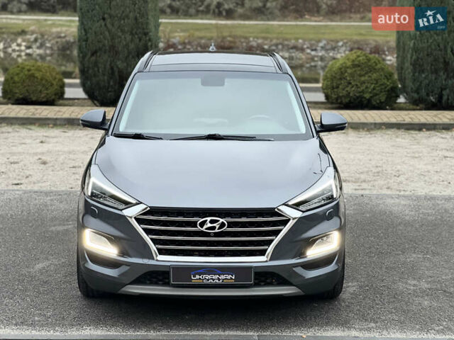 Серый Хендай Туксон, объемом двигателя 2 л и пробегом 117 тыс. км за 20600 $, фото 7 на Automoto.ua