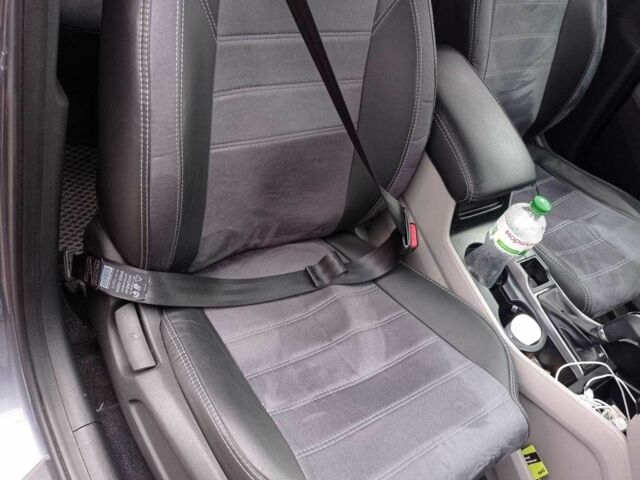 Сірий Хендай Туксон, об'ємом двигуна 2 л та пробігом 128 тис. км за 16800 $, фото 5 на Automoto.ua