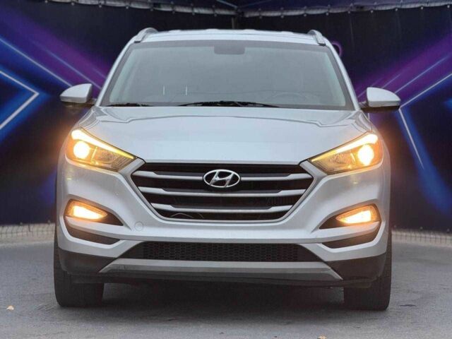 Серый Хендай Туксон, объемом двигателя 1.6 л и пробегом 66 тыс. км за 16999 $, фото 2 на Automoto.ua