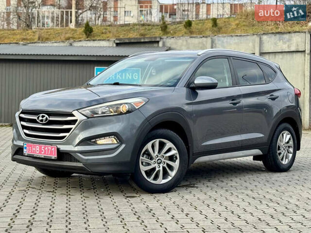 Сірий Хендай Туксон, об'ємом двигуна 2 л та пробігом 184 тис. км за 13950 $, фото 46 на Automoto.ua