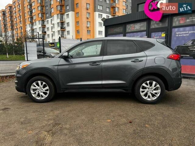 Серый Хендай Туксон, объемом двигателя 1.98 л и пробегом 139 тыс. км за 19500 $, фото 7 на Automoto.ua