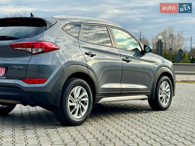 Сірий Хендай Туксон, об'ємом двигуна 2 л та пробігом 184 тис. км за 13950 $, фото 39 на Automoto.ua
