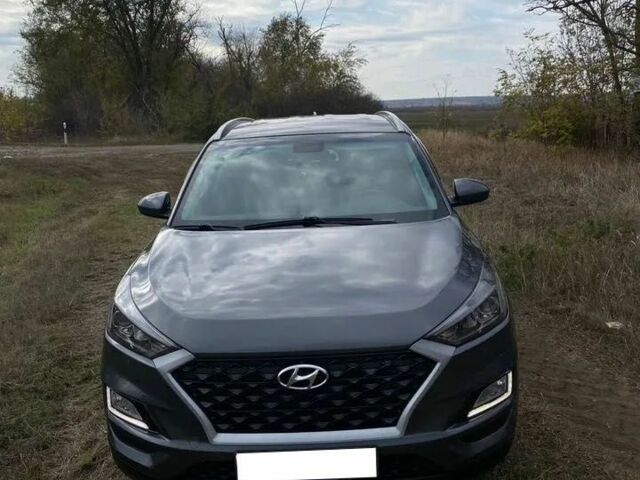 Серый Хендай Туксон, объемом двигателя 2 л и пробегом 99 тыс. км за 9600 $, фото 3 на Automoto.ua
