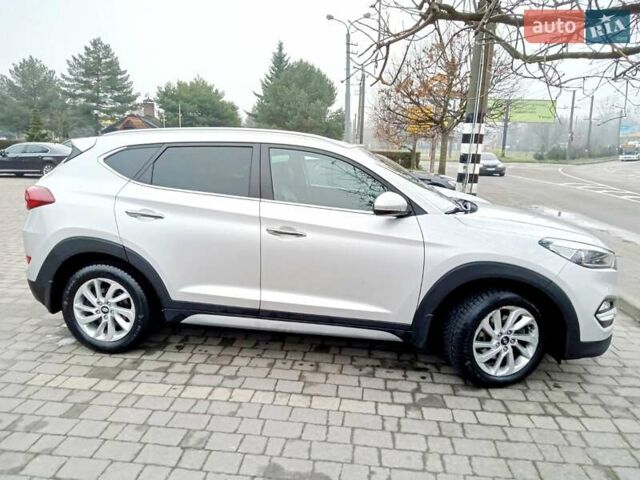 Сірий Хендай Туксон, об'ємом двигуна 2 л та пробігом 61 тис. км за 21900 $, фото 2 на Automoto.ua